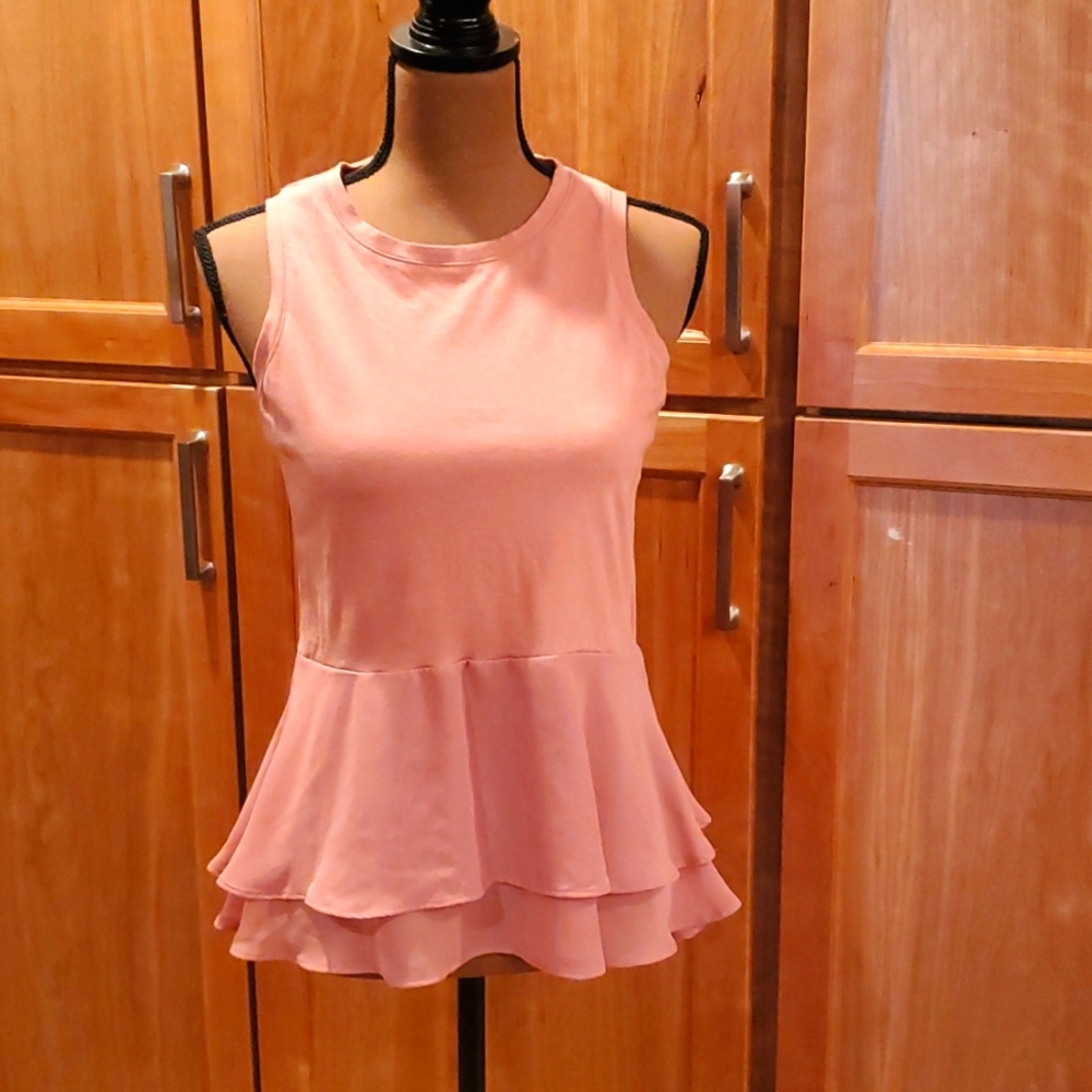 Pink sleeveless blouse